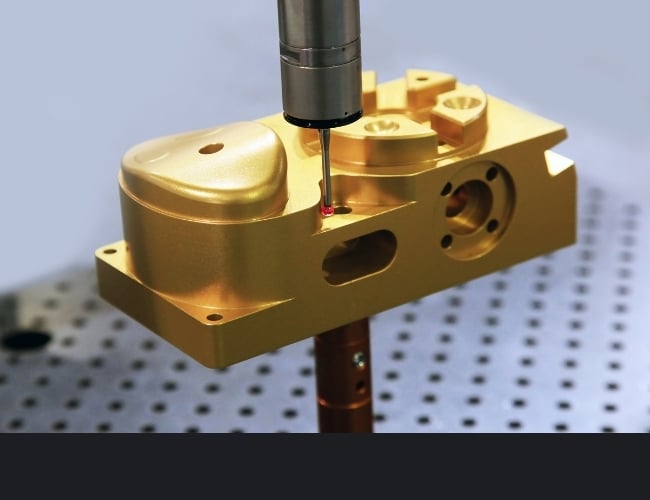 CMM inspects profile on a bronze component